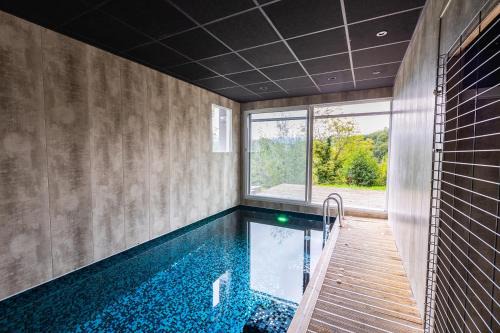 Saint-Cassin Appartement | Gîte, Spa Kyo-alpes, piscine intérieure privée prés de Chambéry