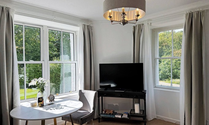 West Laroch Appartement | Garden Flat - set in beautiful large garden with old church ruins on the grounds