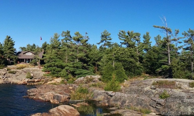 The Archipelago Cottage | Georgian Bay Private island, unique authentic log cabin