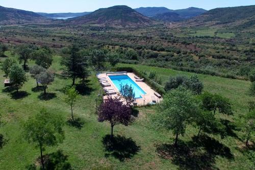 Le Puech Appartement | Gite Bergerie Piscine avec vue panoramique sur le Lac du Salagou