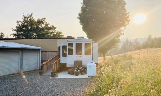 Ariel Maison | Glamping at Coyote Ridge! Camp out in style in a luxury cottage RV! W/firepit