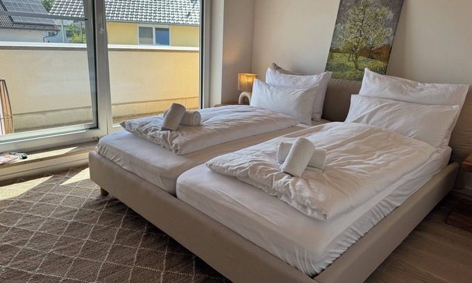 Worthsee Appartement | ღLIBORIA Idyllic roof terrace apartment with a view of Lake Wörth