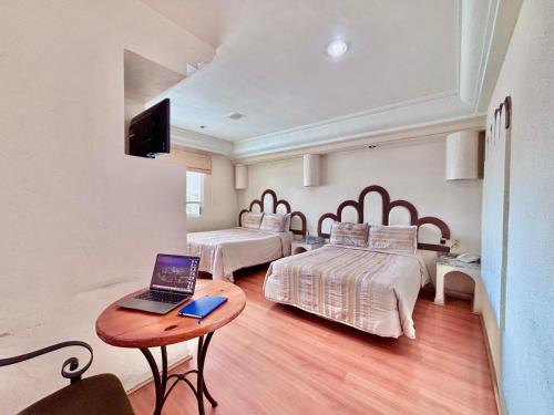 Cuautlancingo Hôtel | Global Express Puebla - FINSA