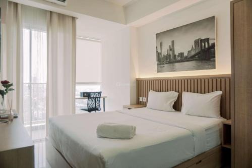 Pinang Appartement | Good and Homey Studio at Pacific Garden Alam Sutera Apartment By Travelio