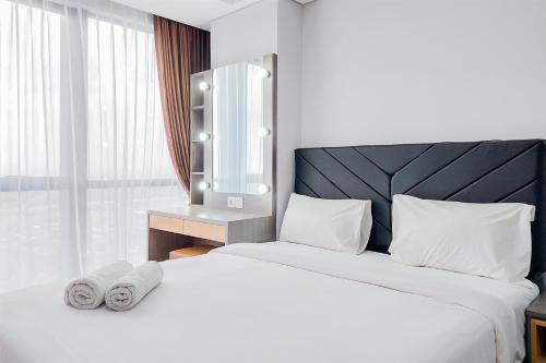 Pinang Appartement | Good and Restful 1BR at The Smith Alam Sutera Apartment By Travelio