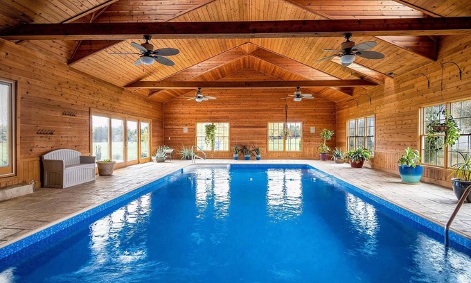 Radnor Maison | Gorgeous Home featuring an Indoor Heated Pool, Gourmet Kitchen & Outdoor Spaces