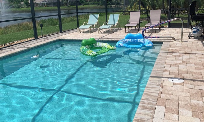 Beachwalk Isles Maison | Gorgeous lake view sunsets with heated, enclosed pool. Close to beaches and golf