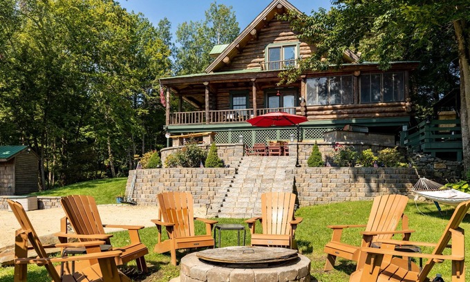 Farmington Maison | GORGEOUS log home with hot tub and private beach on peaceful Baxter Lake in NH