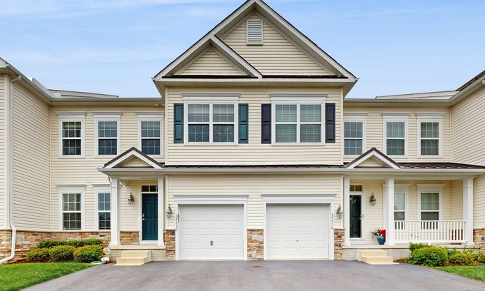 Rehoboth Beach Maison | Grande at Canal Pointe townhome with pools, sports courts, & gym