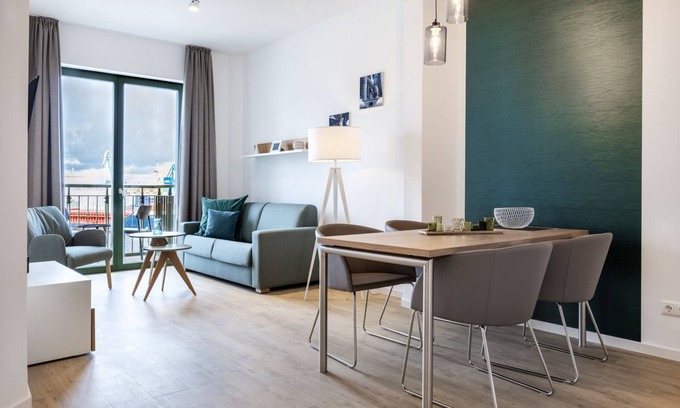 Wismar Appartement | Great apartment in the harbor with a balcony and a view of the maritime harbor life - Krusespeicher