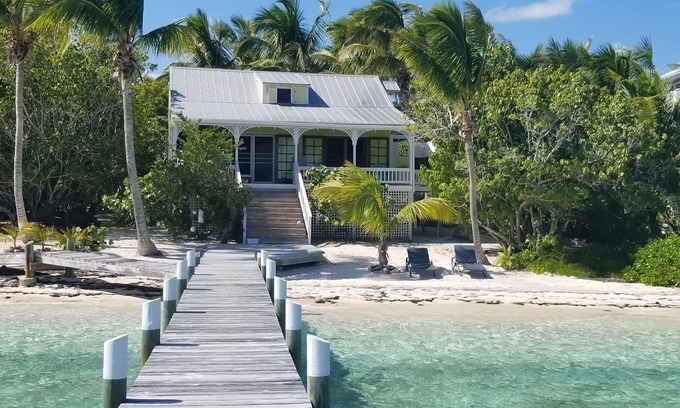 Lubbers Quarters Cay Maison | Green Bananas Cottage avec plage de sable et quai privé
