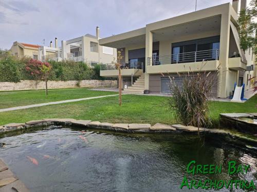 Drepano Maison | Green Bay Arachovitika
