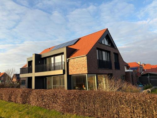 Neuharlingersiel Maison | Großzügiges modernes Ferienhaus