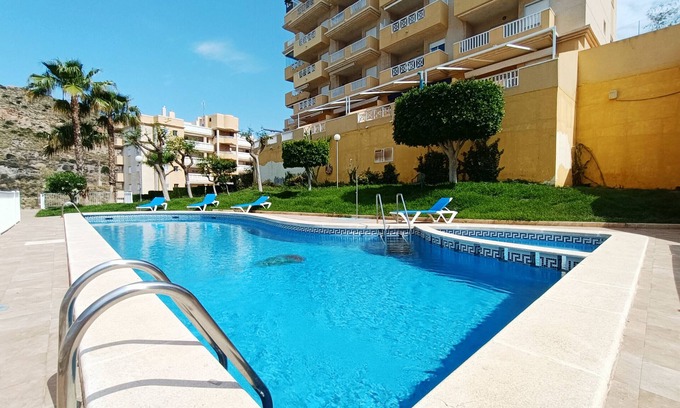Cala Reona Appartement | Appartement rez de chaussée, vue sur la mer, parking, piscine commune