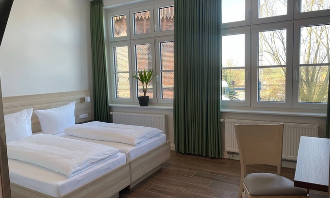 Pasewalk Appartement | Guesthouse Besandung - Apartment 302 - Lokschuppen Pasewalk- Guesthouses with double room, single room and kitchen