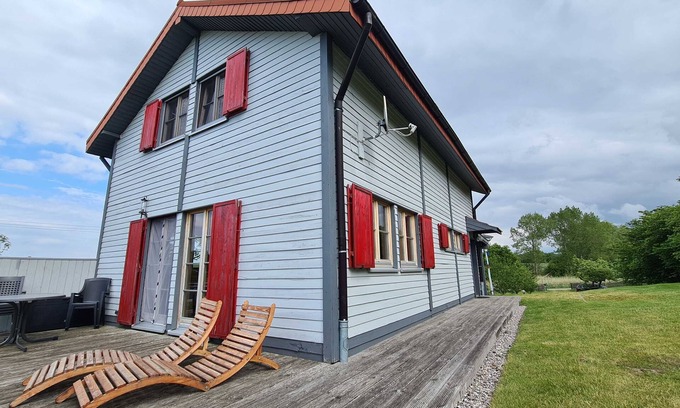 Rerik Cabine | H12 Holz-Ferienhaus Haffblick Russow près de Ostseebad Rerik - Cottage en bois de 4 pièces avec cheminée (100 m²;