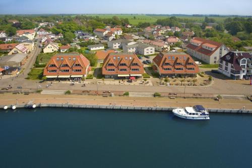 Wiek Appartement | hafennahe Ferienwohnung mit Balkon und Meerblick - Hafenhäuser Wiek Wohnung 05