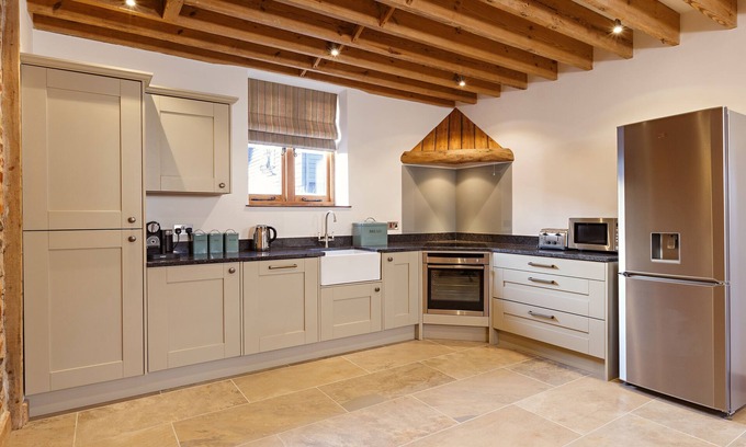 Bodham Maison | Manor Farm Granges de vacances. Un complexe de 6 granges pouvant accueillir de 4 à 10 personnes