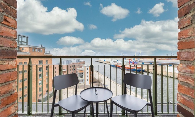 Wismar Appartement | Harbor residence with gallery bedroom, roof terrace and unique harbor view - Krusespeicher