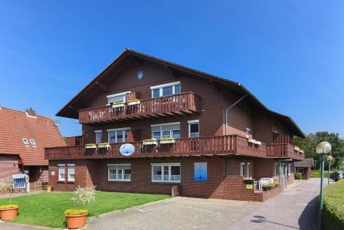 Neuharlingersiel Appartement | Haus Hafenromantik