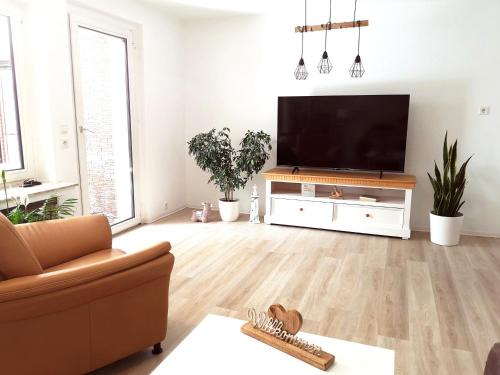 Esens Appartement | Haus Meereswind, 3xSchlafzimmer Wintergarten Garten Badewanne