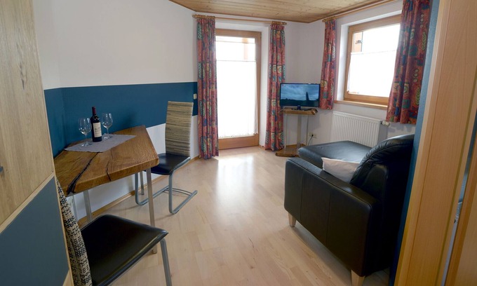 Hopfen am See Copropriété | Haus Vöhringer - Modern vacation apartment in a top location directly on Lake Hopfensee in the Allgäu