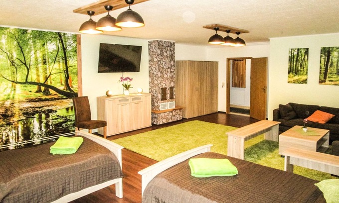 Mecklenburger Seenplatte Appartement | Appartement au sous-sol de haute qualité à Ihlenfeld, moderne et calme