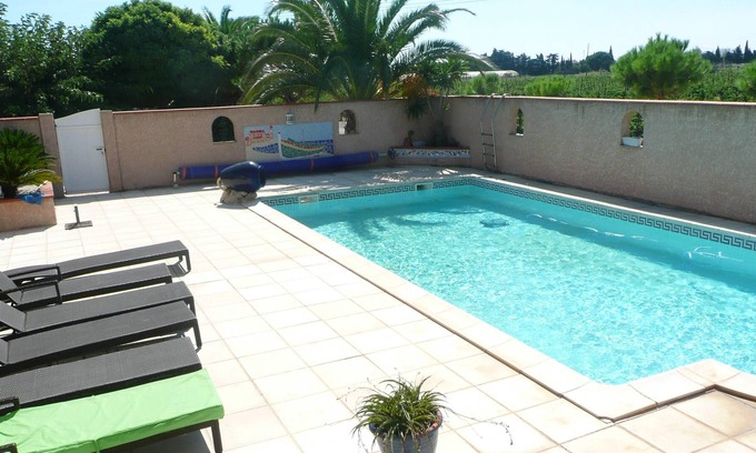Saint-Hippolyte Maison | Homerez - Maison à 3 km de la plage pour 7 pers. avec piscine partagée et balcon
