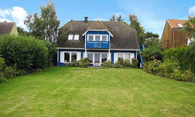 Dandorf Appartement | Appartement de vacances avec balcon, vue sur l'eau et le jardin