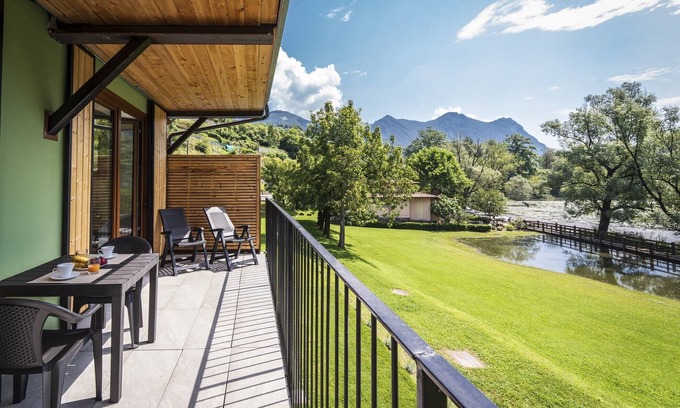 Carlazzo Appartement | Appartement de vacances "1" avec vue sur lac, piscine partagée et jardin partagé