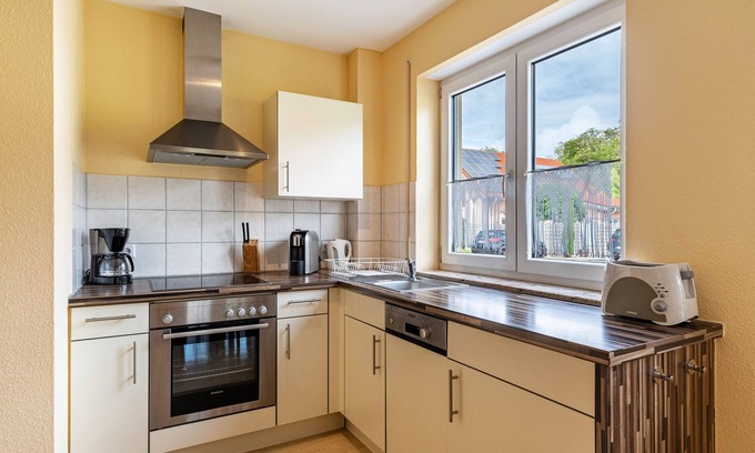 Ringsheim Appartement | Holiday Apartment "Biehler" with Private Terrace, Shared Garden & Wi-Fi