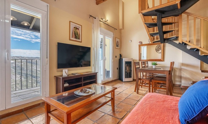 Pradollano Appartement | Appartement de vacances "Duplex 23 E" avec vue sur la montagne, terrasse privée et Wi-Fi