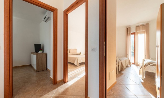 Masainas Appartement | Holiday Apartment "Is Lais 3" with Sea View, Shared Garden & Wi-Fi