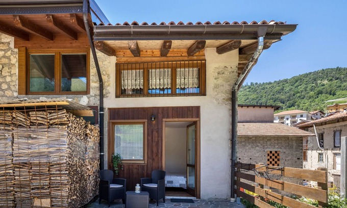 Ronzo-Chienis Appartement | Appartement de vacances "Agritur Piazera Con Terrazzo" avec vue sur la montagne