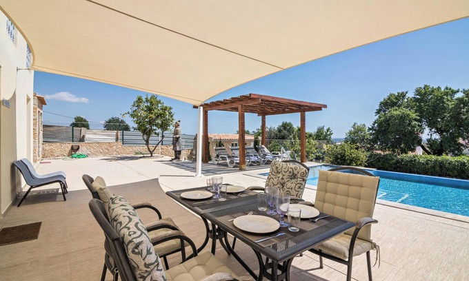 Cerro do Mocho Appartement | Appartement Mel de Flor avec vue sur la mer, piscine à débordement partagée, jardin partagé et Wi-Fi