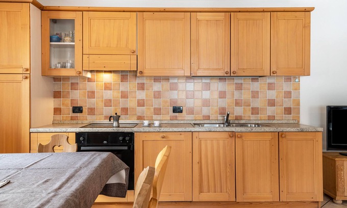 San Giovanni di Fassa Maison | Holiday Home 'Casa Titol Ami' with Mountain View, Balcony and Wi-Fi