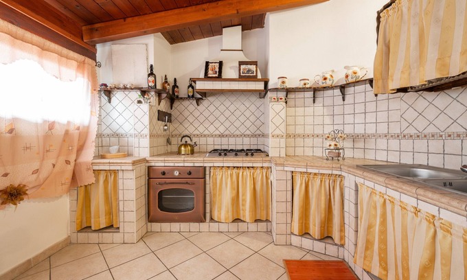 San Giovanni Suergiu Maison | Holiday Home 'Gaia Casa Vacanze' with Private Terrace, Balcony and Air Conditioning