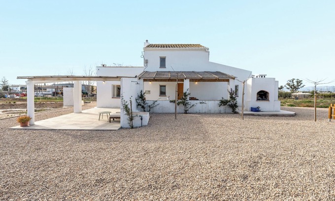 Sant Jaume d'Enveja Maison | Maison de vacances 'Mas Midó' avec vue sur la montagne, Wi-Fi et climatisation