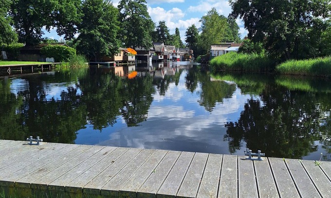 Guestrow Maison | Holiday Home 'Am Wasser, Bootshaus' with Private Terrace