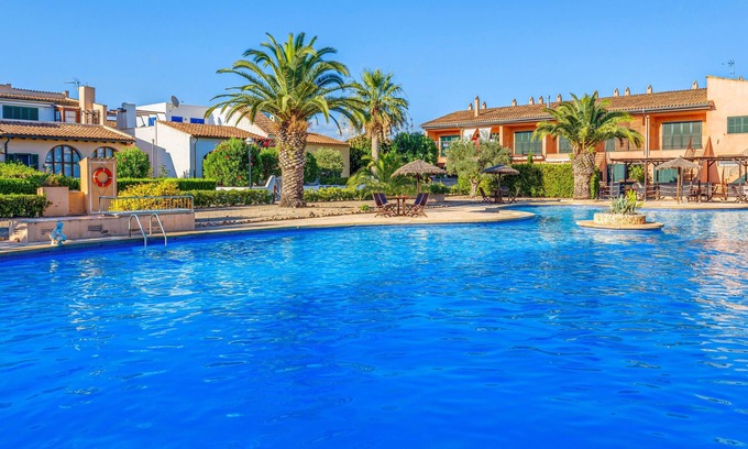 Campos Maison | Maison de vacances "Can Om" avec jardin, terrasse, piscine partagée et Wi-Fi