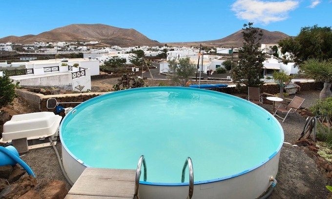 Guatiza Maison | Maison de vacances Casa Caldereta avec vue sur les montagnes, piscine, Wi-Fi et terrasse