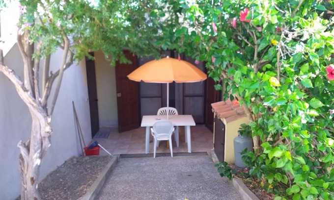 Funtana Meiga Maison | Holiday Home 'Casa Funtana Meiga' close to the Beach with Sea View, Shared Garden & Terrace