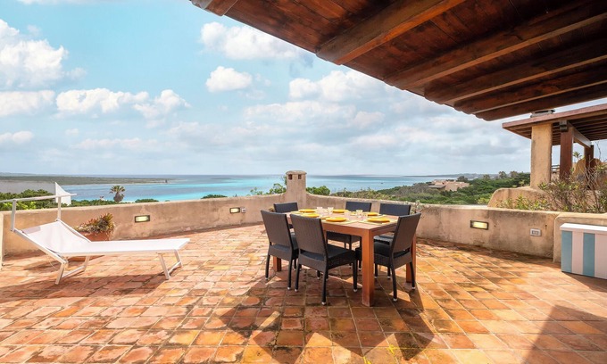 La Pelosa Maison | Maison de vacances 'Casa Marina' avec vue sur la mer, terrasse privée et climatisation