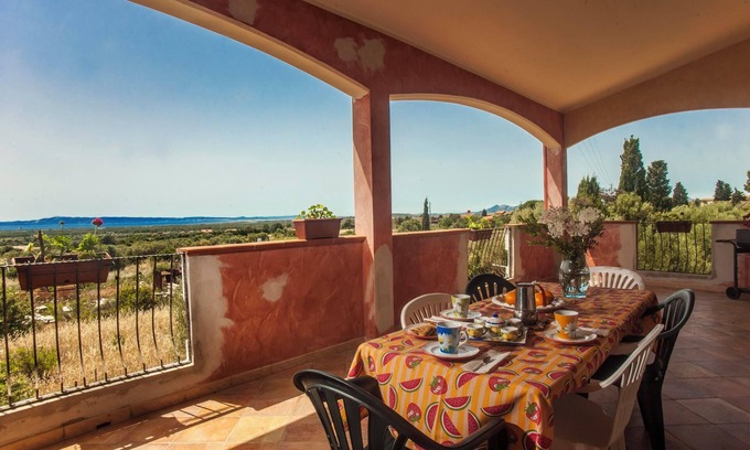 Masainas Maison | Maison de vacances "Elena" avec vue sur mer, climatisation et terrasse