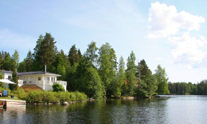 Asbro Maison | Holiday home,fantastic view of the lake,own boat and a small private footbridge