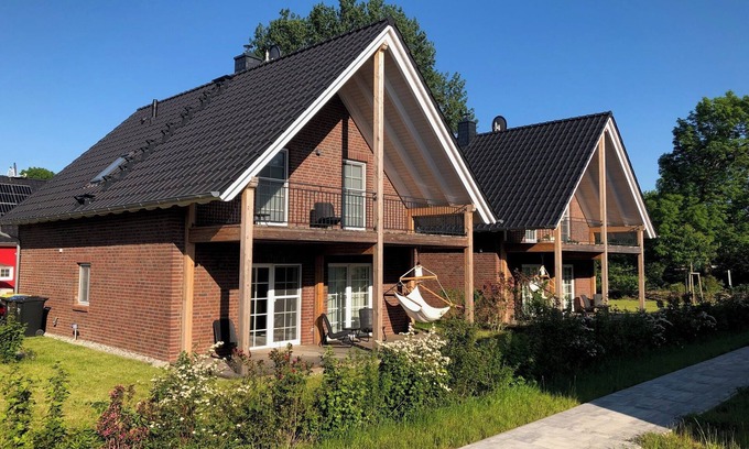 Krummin Maison | Maison de vacances "Ferienhaus Familienkoje Rike" avec jardin privé, sauna privé et Wi-Fi