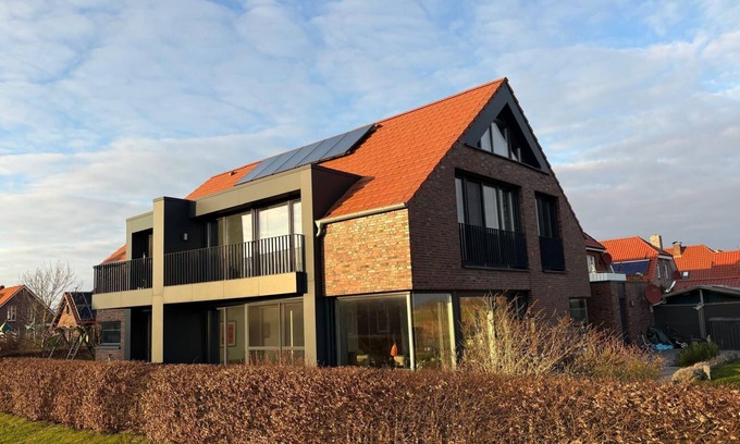 Neuharlingersiel Maison | Maison de vacances 'Großzügiges Modernes' avec terrasse partagée, jardin privé et Wi-Fi