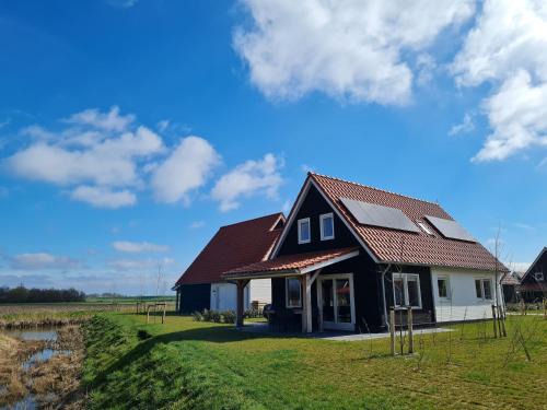 Scherpenisse Maison | Holiday Home in Scherpenisse near the Sea