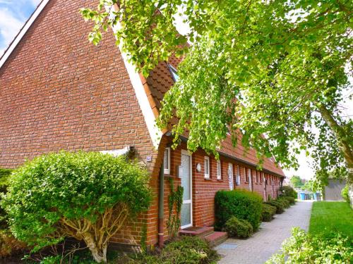 Norddeich Maison | Holiday Home Koralle-1 by Interhome