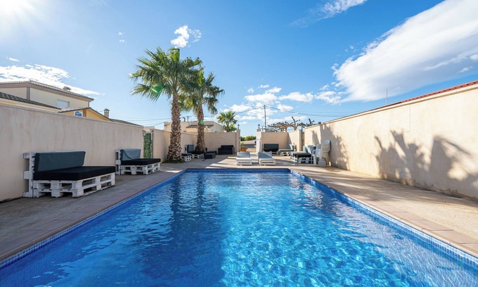 El Ligallo del Ganguil Maison | Maison de vacances "La Marquesa" avec piscine, jardin et Wi-Fi partagés.